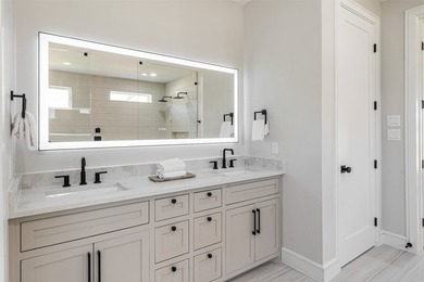 This modern farmhouse mini mansion on the water is truly a - photo 14