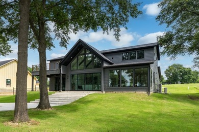 This modern farmhouse mini mansion on the water is truly a - photo 35