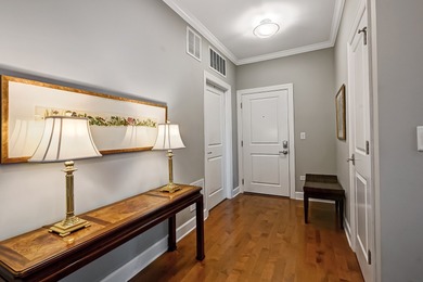 Sunlight pours into this stunning second floor, corner condo in