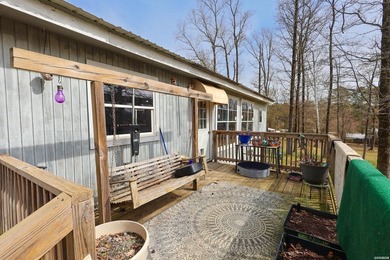 Conveniently located near Lake Greeson and area ATV trails, this - photo 2