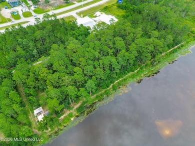 Escape to the quiet side of coastal living with this .70-acre - photo 3