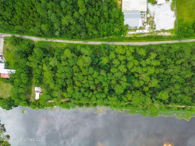 Escape to the quiet side of coastal living with this .70-acre - photo 5