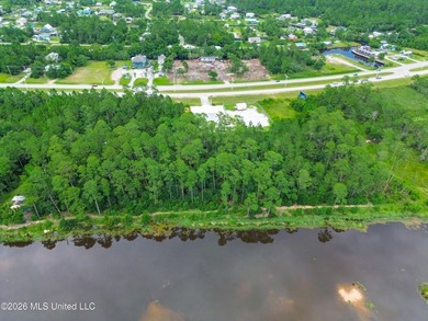 Escape to the quiet side of coastal living with this .70-acre - photo 6