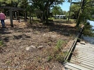 This property is a double lot, located on canal with bulkhead - photo 3