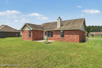 New to the market! This inviting 3-bedroom, 2-bath home offers a - photo 3