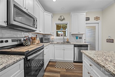 Welcome Home to Chimney Oaks Golf Club! This end unit townhome - photo 8