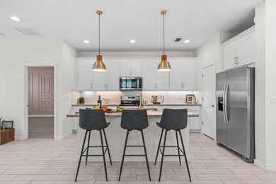 Beautifully upgraded and filled with natural light, this - photo 4