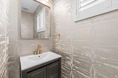 Beautifully upgraded and filled with natural light, this - photo 9