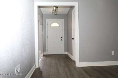 Completely remodeled and move-in ready! This beautifully updated - photo 2