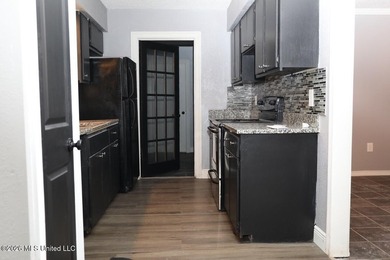 Completely remodeled and move-in ready! This beautifully updated - photo 10