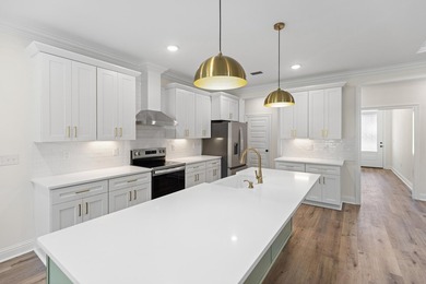 Stunning craftsmanship in this new construction all-brick - photo 14