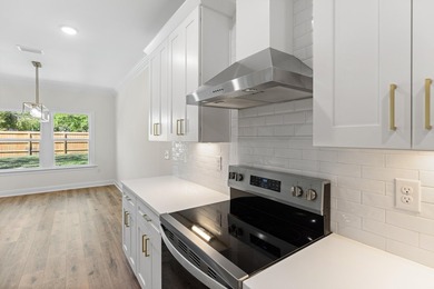 Stunning craftsmanship in this new construction all-brick - photo 16