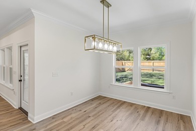 Stunning craftsmanship in this new construction all-brick - photo 17