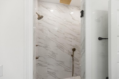 Stunning craftsmanship in this new construction all-brick - photo 27