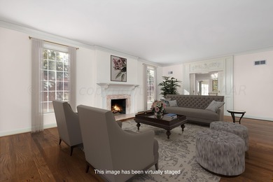 Refined living under the big elms on the brick streets. This