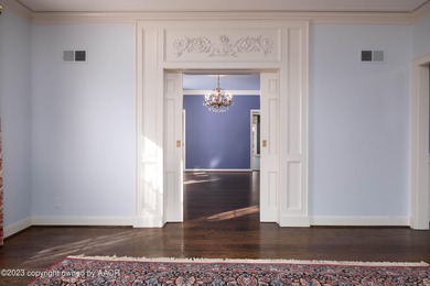 Refined living under the big elms on the brick streets. This