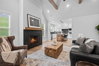 Soaring vaulted ceilings with wood beams, gas log fireplace & - photo 8