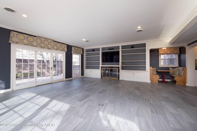 Refined living under the big elms on the brick streets. This