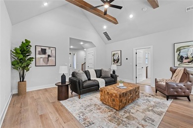 Soaring vaulted ceilings with wood beams, gas log fireplace & - photo 9