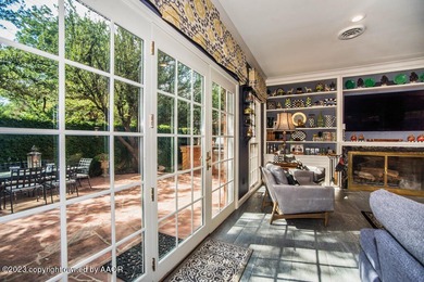 Refined living under the big elms on the brick streets. This