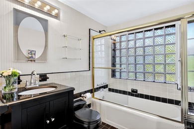 Storybook charm meets timeless elegance in this classic Tudor - photo 13