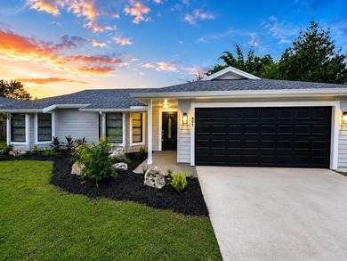 Welcome home to this beautifully updated modern residence where - photo 1