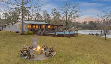 SUNSETS AND VIEWS FOR DAYS! This stunning fee simple lake home - photo 2