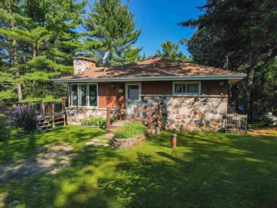 If you are looking for privacy in a beautiful setting, this is - Lake Home For Sale in Wautoma, Wisconsin