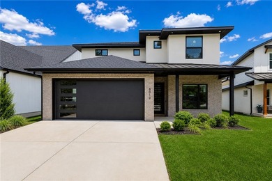 Welcome to this beautifully appointed home in the sought-after - photo 1