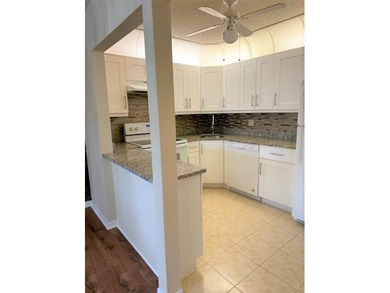 Welcome to this charming 55+ two-story condo located on the - photo 11