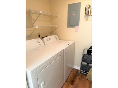 Welcome to this charming 55+ two-story condo located on the - photo 12