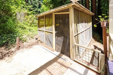 Nestled beneath a canopy of majestic redwood trees on a spacious - photo 29