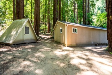 Nestled beneath a canopy of majestic redwood trees on a spacious - photo 35