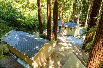 Nestled beneath a canopy of majestic redwood trees on a spacious - photo 40