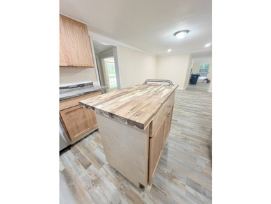 Discover the perfect starter home or weekend getaway in this - photo 13