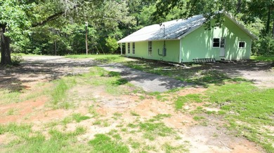 Discover the perfect starter home or weekend getaway in this - photo 32