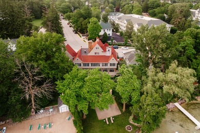Wake up to lake views & idyllic village setting in this - photo 5