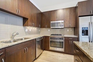 Modern Mill District Condo with a spacious floorplan flooded - photo 17