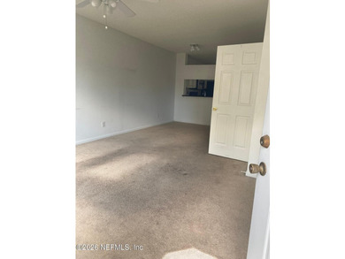 This spacious end-unit condo offers an inviting open floor plan - photo 2