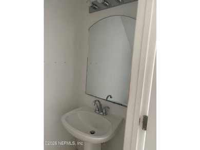 This spacious end-unit condo offers an inviting open floor plan - photo 3