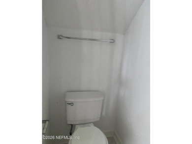 This spacious end-unit condo offers an inviting open floor plan - photo 4