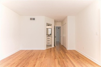 A rare find! Welcome to this sought-after one level end unit in - photo 12