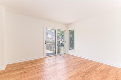 A rare find! Welcome to this sought-after one level end unit in - photo 14