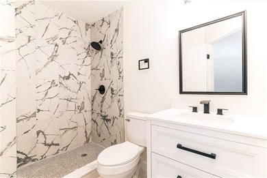 A rare find! Welcome to this sought-after one level end unit in - photo 16