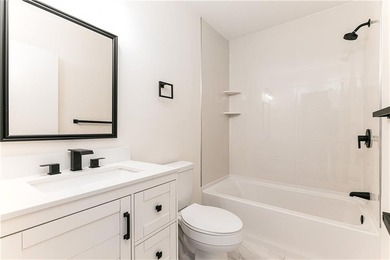 A rare find! Welcome to this sought-after one level end unit in - photo 19