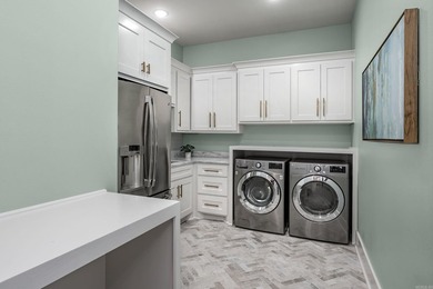 Tucked inside the prestigious gated golf course community of - photo 11