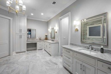 Tucked inside the prestigious gated golf course community of - photo 14