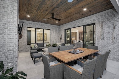 Tucked inside the prestigious gated golf course community of - photo 15