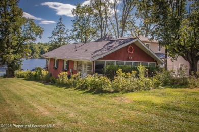 Lake Home For Sale in Fleetville, Pennsylvania