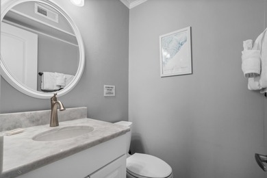 Experience coastal living at its finest in this beautifully - photo 43